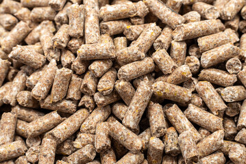 Background from compound feed. Feed for pigs, cows, chickens. Compound feed