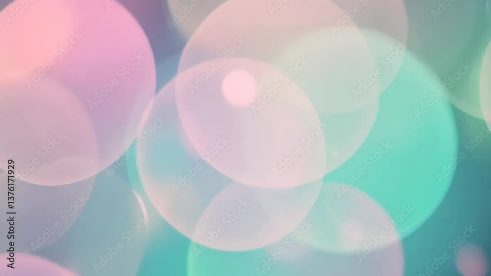 Poster a blue and pink background with a bunch of circles. the circles are different sizes and colors. the 