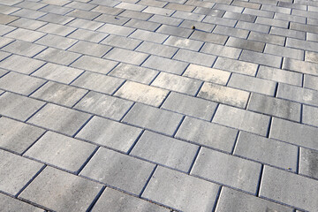 Paving Slab Texture. Sidewalk Tiles background, texture. Paving Slabs background. Stone paving slab sidewalk. Sidewalk tile paving for footpath. Pedestrian road from Sidewalk Tile. Street tile pattern