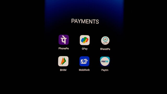 New Delhi, India - April 01, 2025: Digital Payments Apps on Smartphone Screen Featuring PhonePe, GPay, BharatPe, BHIM, MobiKwik, and Paytm &ndash; UPI and E-Wallet Technology for Cashless Transactions.