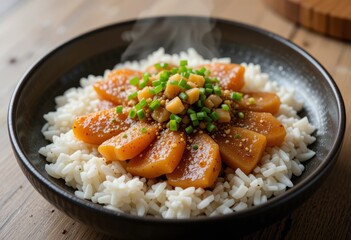 A video clip of a spicy mackerel fish curry being served with rice, and a photo of a delicious tomato chicken stew with rice on the side.