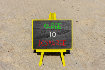 Agree to disagree symbol. Concept words Agree to disagree on beautiful blackboard. Beautiful brown...