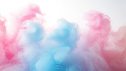 Abstract pastel smoke swirls in soft light.  Gentle pastel hues of pink and blue blend in a flowing, ethereal display. 