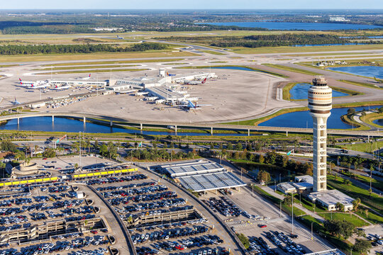 Aerial view photo of Orlando International Airport with Terminal Concourse Airside 4 and Tower in Orlando, United States