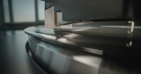 Vinyl Record Rotating On Retro Turntable. Stylus Needle Touching Grooves, Playing Sound on Vinyl...