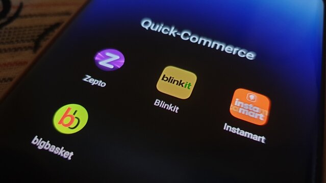 New Delhi, India - March 31 2025: Quick commerce apps icon on smartphone screen. 10 min grocery items delivery in Indian cities. Zepto, Blinkit, Swiggy Instamart, Bigbasket etc.