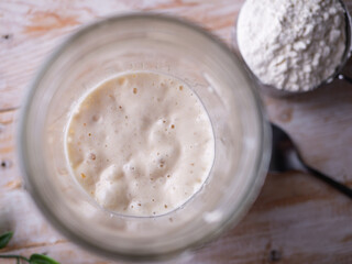 Fermenting Sourdough Starter Wild Yeast in a Kitchen Jar.