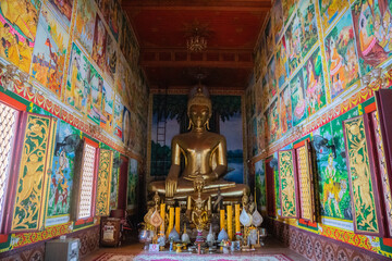 The Majestic Golden Buddha Statue Gracefully Surrounded by Lush Natures Beauty Vientiane, Laos