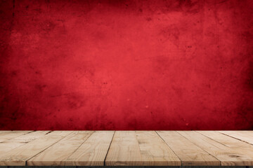 Wood table and red cement wall background in kitchen, Wooden shelf, counter for food and product display in red room background, Wood table top, desk surface banner, mockup, template 