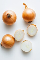 Shiny onions arranged artistically with focus on their smooth te