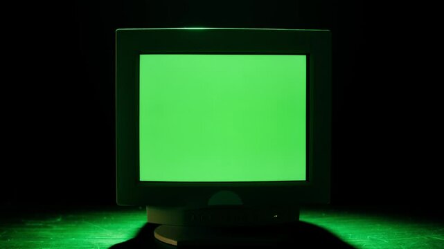 Retro pc with loading code console, programmer making scripts, green basic screen, Old computer studio close-up, Desktop vintage retro wave display, late 90s PC.