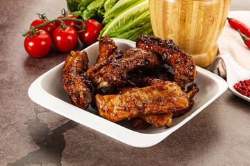 Grilled pork ribs in barbecue sauce