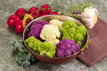 Raw cauliflower different colors heap