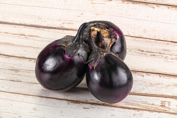 Raw violet and black eggplant