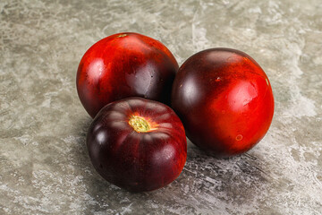Black ripe juicy organic tomato