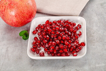 Ripe sweet red pomegranate seeds