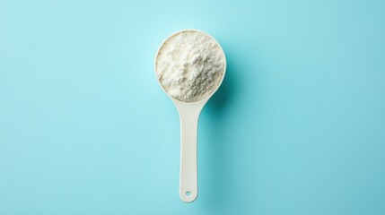 Top Down View of Whey Protein in Measuring Scoop