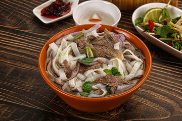 Vietnamese Pho Bo soup with beef and noodles