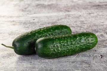 Ripe green raw two cucumbers
