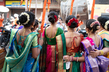  Mumbai , India -  30 March 2025 On the day of Gudi Padwa women have come to participate in the Shobha Yatra wearing Marathi traditional dress saree  ..at Girgaon Mumbai Maharashtra India