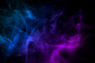 Obraz premium Colorful Abstract Smoke Waves in Blue and Purple Hues on Black Background
