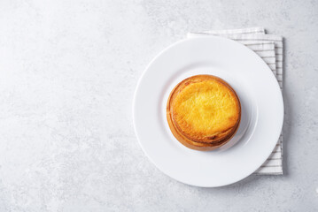 Vanilla cream cheese cake in a plate