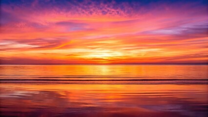 Vibrant Sunset Sky Reflecting Over Calm Ocean Waters in Evening Light