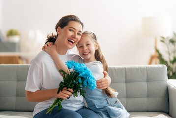 daughter and mom with flowers