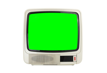 Old vintage white television with green screen isolated on white background.