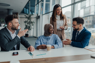 Business people collaborating during meeting in modern office