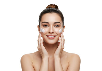 Woman happily using beauty products for skincare routine.