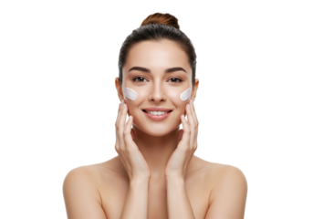 Woman happily using beauty products for skincare routine.