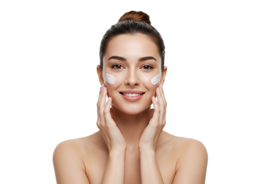 Woman happily using beauty products for skincare routine.