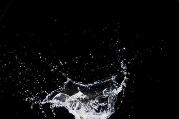Dynamic Splash of Water Against Black Background Capturing Motion and Energy in High-Speed Photography