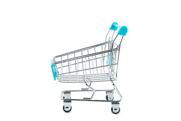 Online shopping concept.Cardboard box and shopping bags in a trolley isolated on white background....