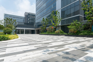 empty concrete ground in front of modern office buildings in downtown. floor for copy space