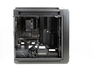 Side view  big tower, PC case, chassis,  inside motherboard, CPU, fan, SSD, memory, power supply unit with cables.