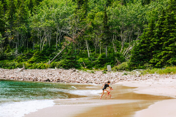 Family enjoying at the beach, Cape Berton Island, Cabot Trail, Nova Scotia, Canada
