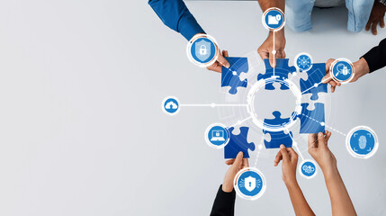 A diverse group collaborates using puzzle pieces that symbolize digital security concepts, emphasizing teamwork and innovation in modern business safety strategies. Amity
