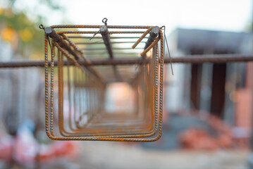 Connection of reinforcement into the frame. A knot tied with a handle. Reinforcement works. Construction.