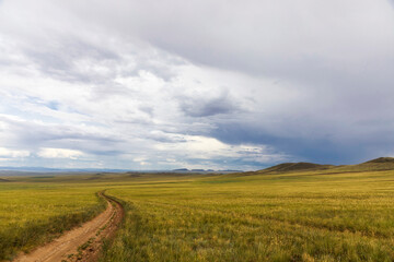 Road in the steppe. Nature of Eastern Siberia. Ubsunur basin. Republic of Tuva. Russia
