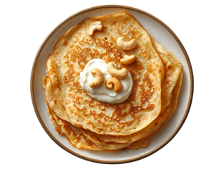 Chickpea crepes topped with cashew nuts and cream isolated on transparent background