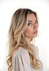 Naklejka premium A woman with long blonde hair wearing a white blouse
