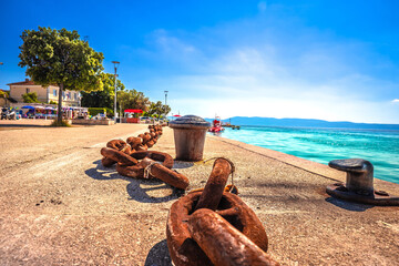 Croatia. Old rusty ship chain on Njivice waterfront view, maritime equipment symbol