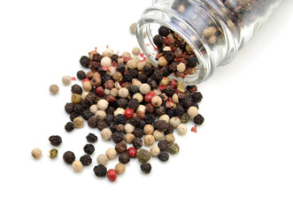 Red and black peppercorns, isolated on white background 