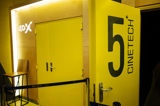 Yellow entrance to 4DX cinema hall with Cinetech 5 sign