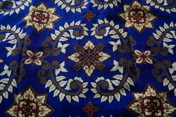 The surface texture of cotton fabric with traditional Indonesian batik motifs