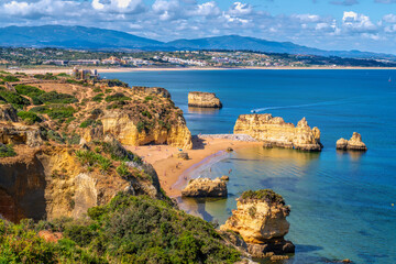 Praia Dona Ana beach Lagos, The Algarve, Portugal with golden sand and blue sea