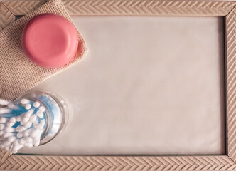 Frame with hygiene products on white background. Personal hygiene concept. Flat lay. Copy space.