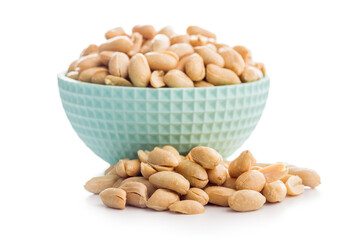 Roasted salted peanuts in bowl isolated on white background.
